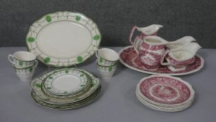 Two part dinner services. One Mason's Vista red and white transfer design service and one green