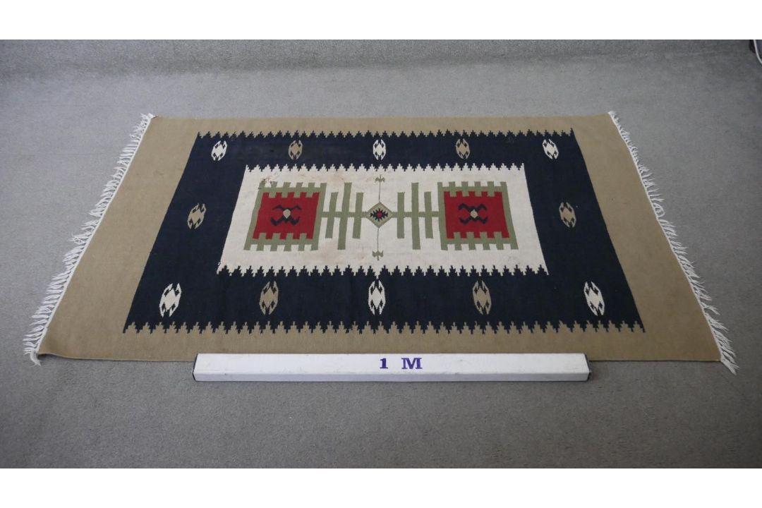 A hand woven Turkish Kelim with geometric serrated pendants on a biscuit ground. L.184 W.117cm - Image 2 of 6