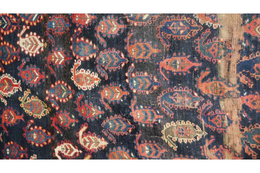 A large Kurdish runner with repeating motifs across the midnight ground within stylised multiple - Image 2 of 5