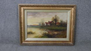 J. Cole (19th Century) A 19th century gilt framed oil on canvas of a riverscape with cottages.