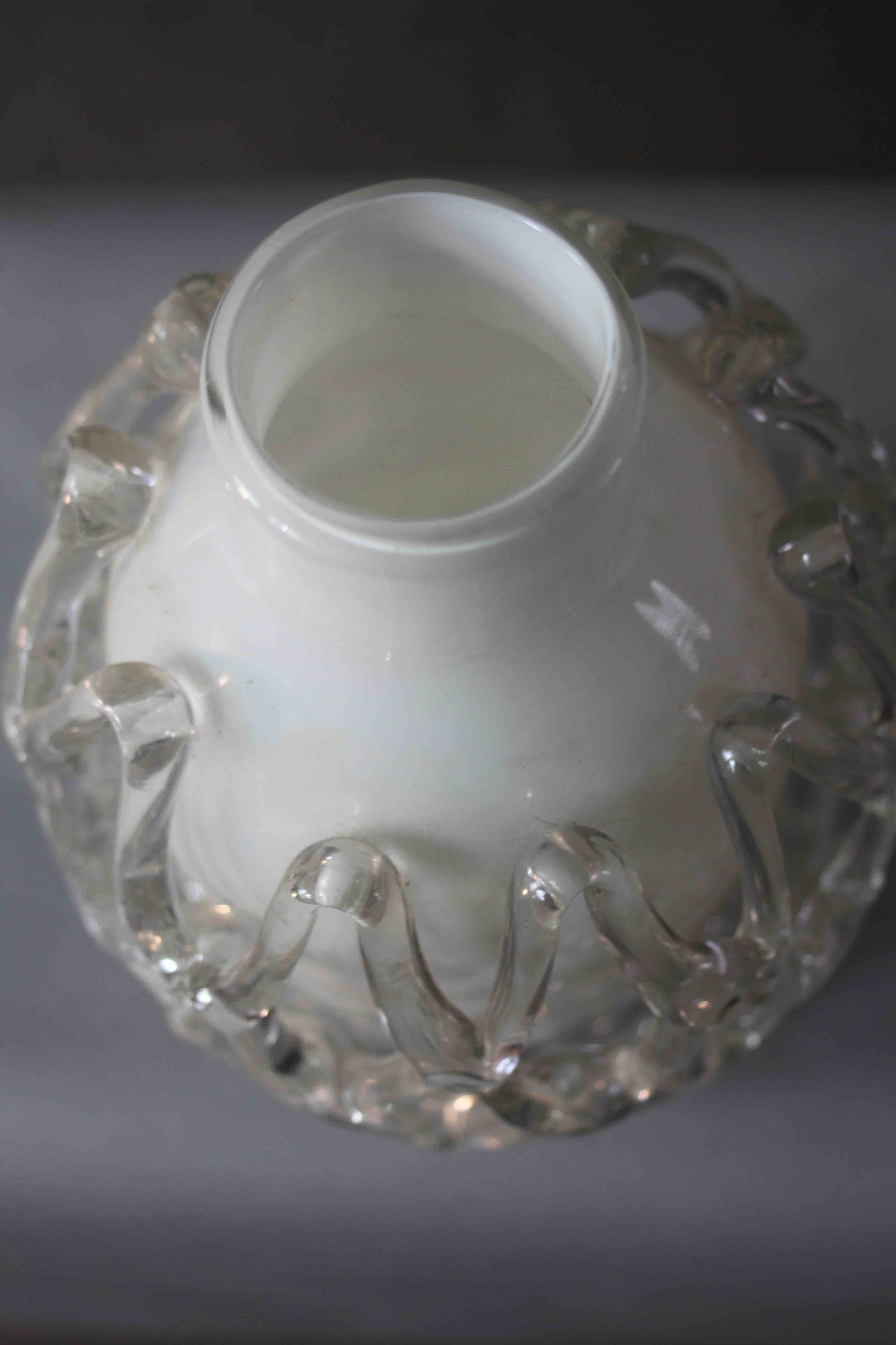 A white and clear Art Glass vase with open work netting design. Label verso. H.31 Diam.20cm. - Image 2 of 4