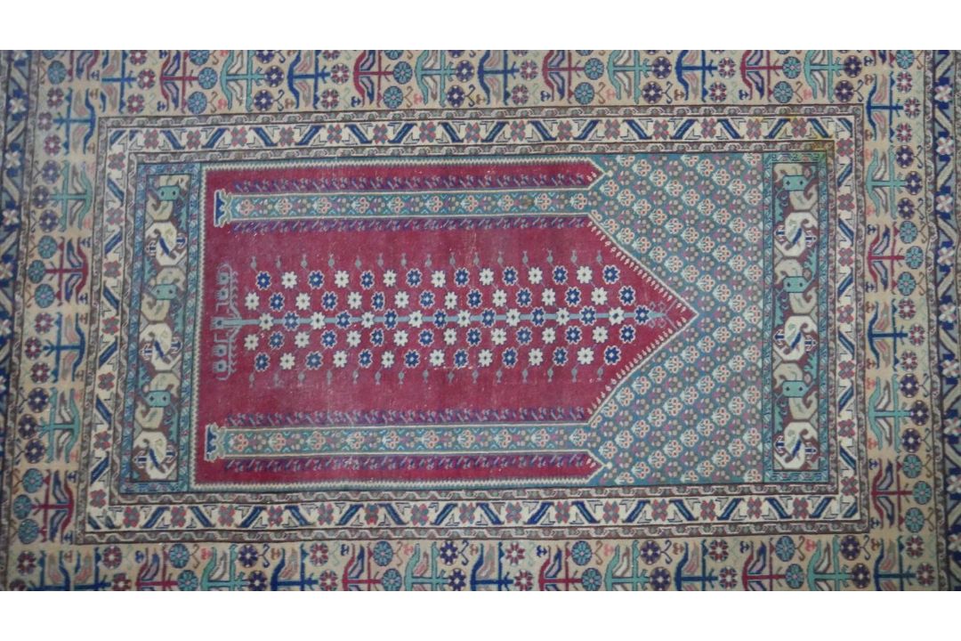 A Turkish Kayseri prayer mat with burgundy ground and floral multiple borders. L.170 W.115cm - Image 3 of 7