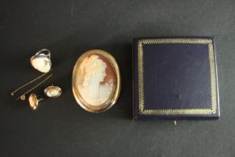 A large Victorian 9 carat carved oval shell cameo brooch (pin broken) along with a vintage silver
