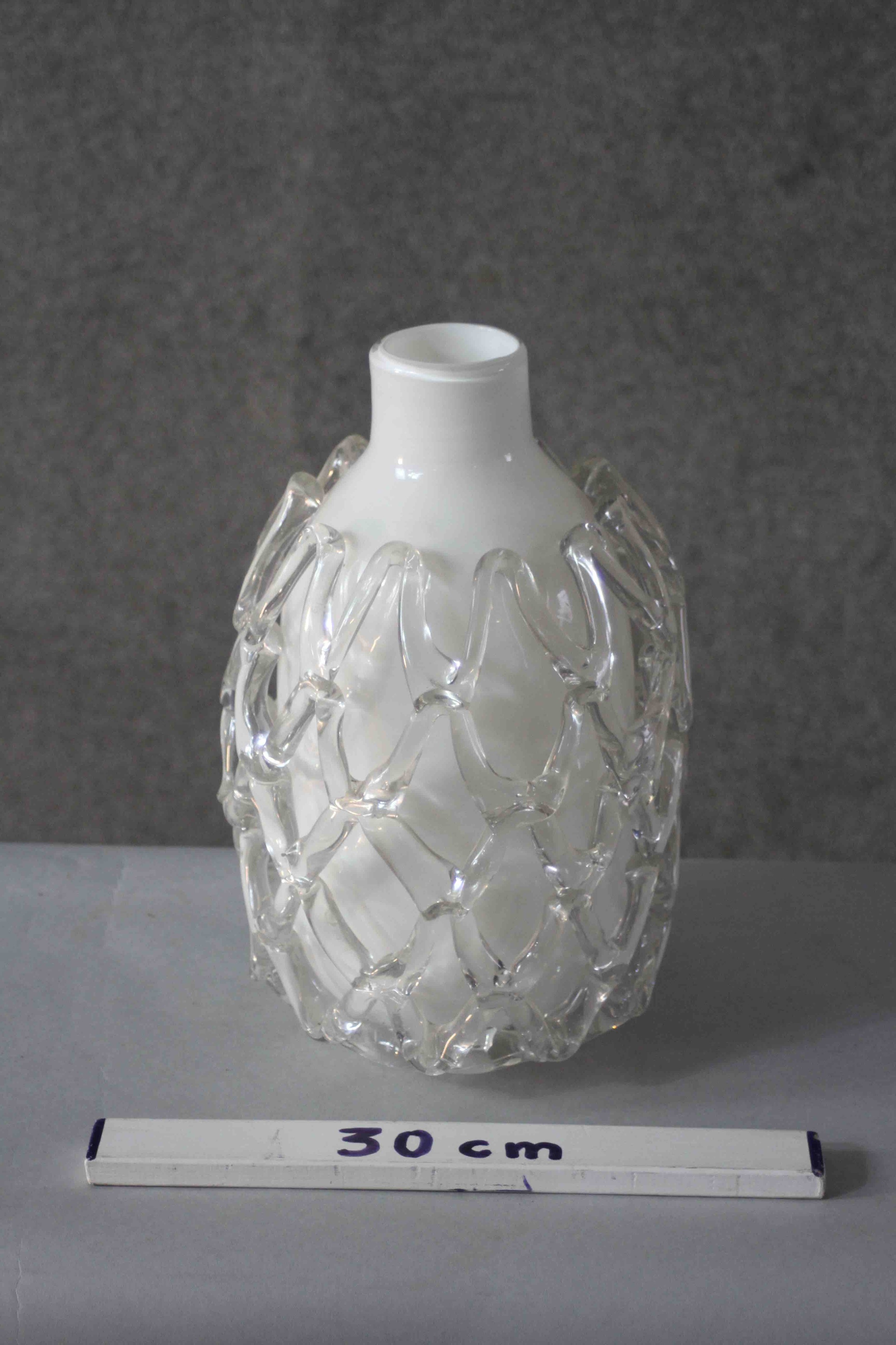 A white and clear Art Glass vase with open work netting design. Label verso. H.31 Diam.20cm. - Image 4 of 4