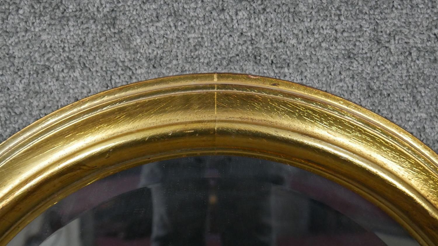 An oval gilt framed mirror. H.71 W.61cm - Image 2 of 4