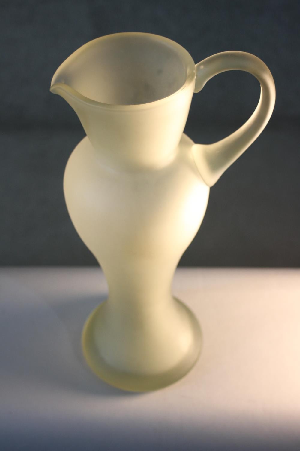 A vintage hand blown frosted clear art glass jug of elongated form. H.39 W.18 D.14cm. - Image 3 of 6