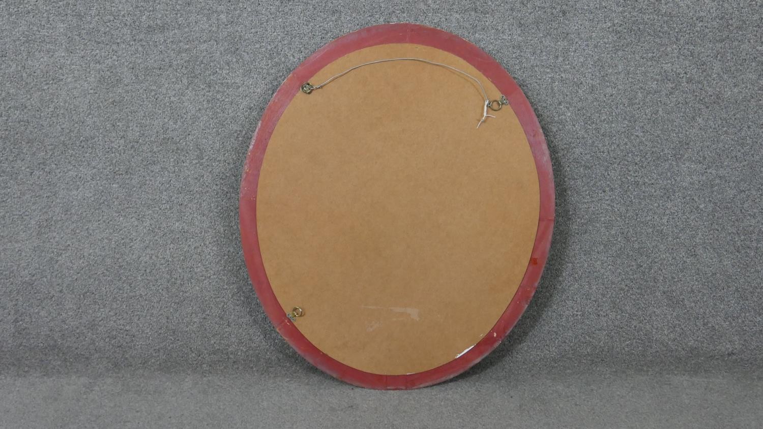 An oval gilt framed mirror. H.71 W.61cm - Image 3 of 4