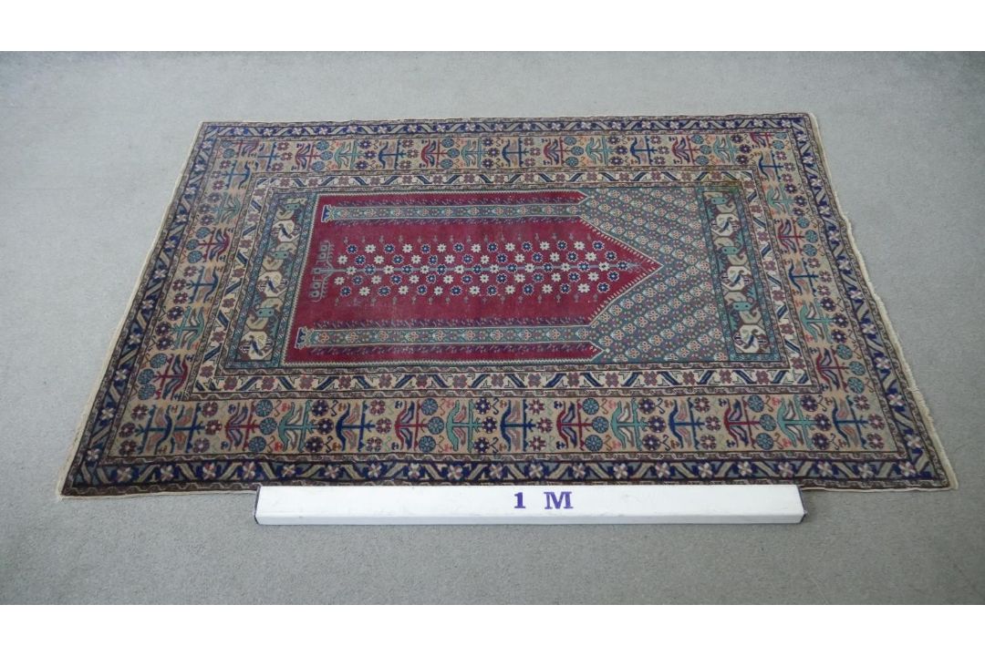 A Turkish Kayseri prayer mat with burgundy ground and floral multiple borders. L.170 W.115cm - Image 2 of 7