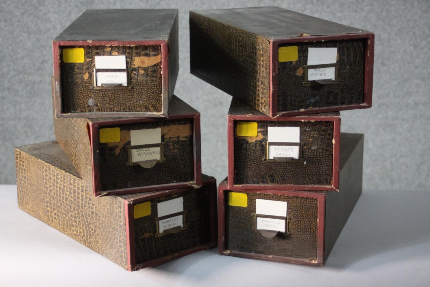 A collection of six vintage faux crocodile skin desk top filing boxes. H.12 W.17 D.39cm.