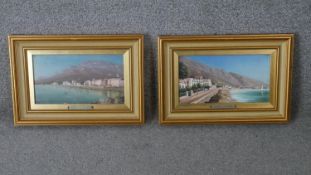 Two gilt framed oils on canvas of Continental coastal townscapes. With metal name plaques;