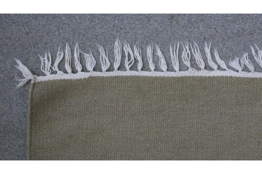 A hand woven Turkish Kelim with geometric serrated pendants on a biscuit ground. L.184 W.117cm - Image 6 of 6