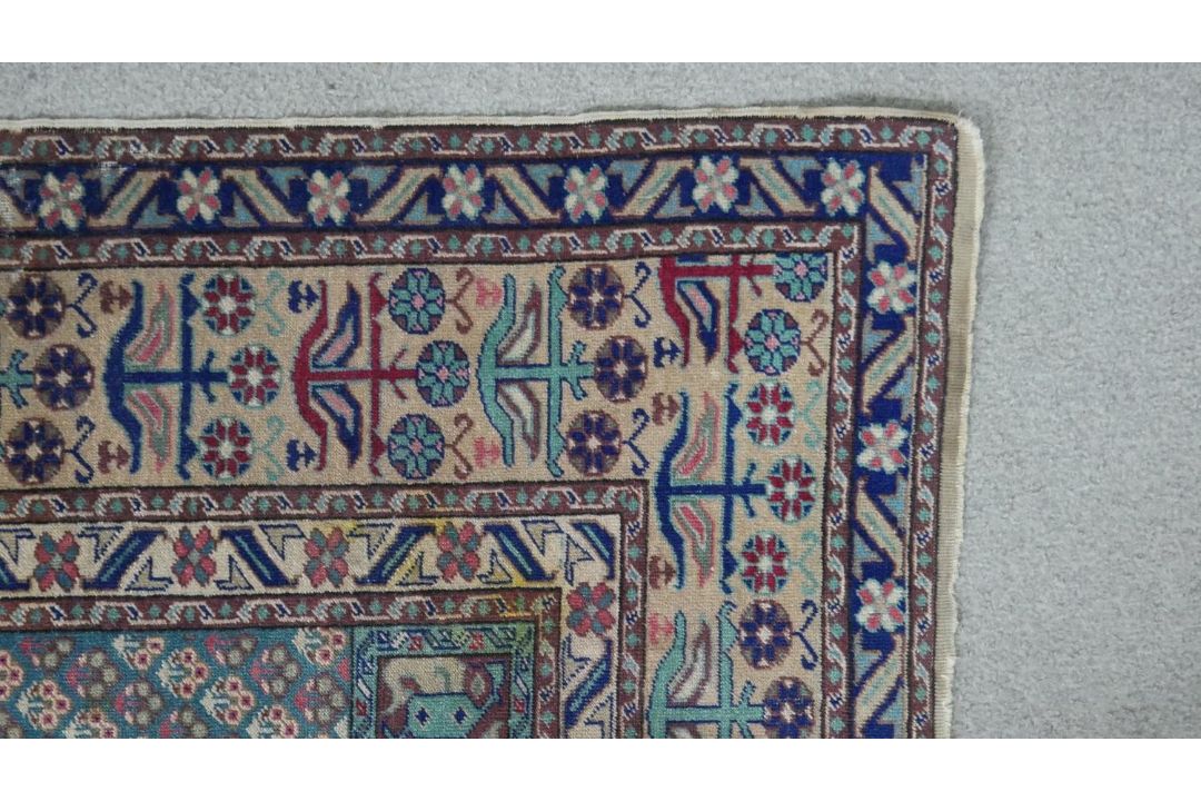 A Turkish Kayseri prayer mat with burgundy ground and floral multiple borders. L.170 W.115cm - Image 5 of 7