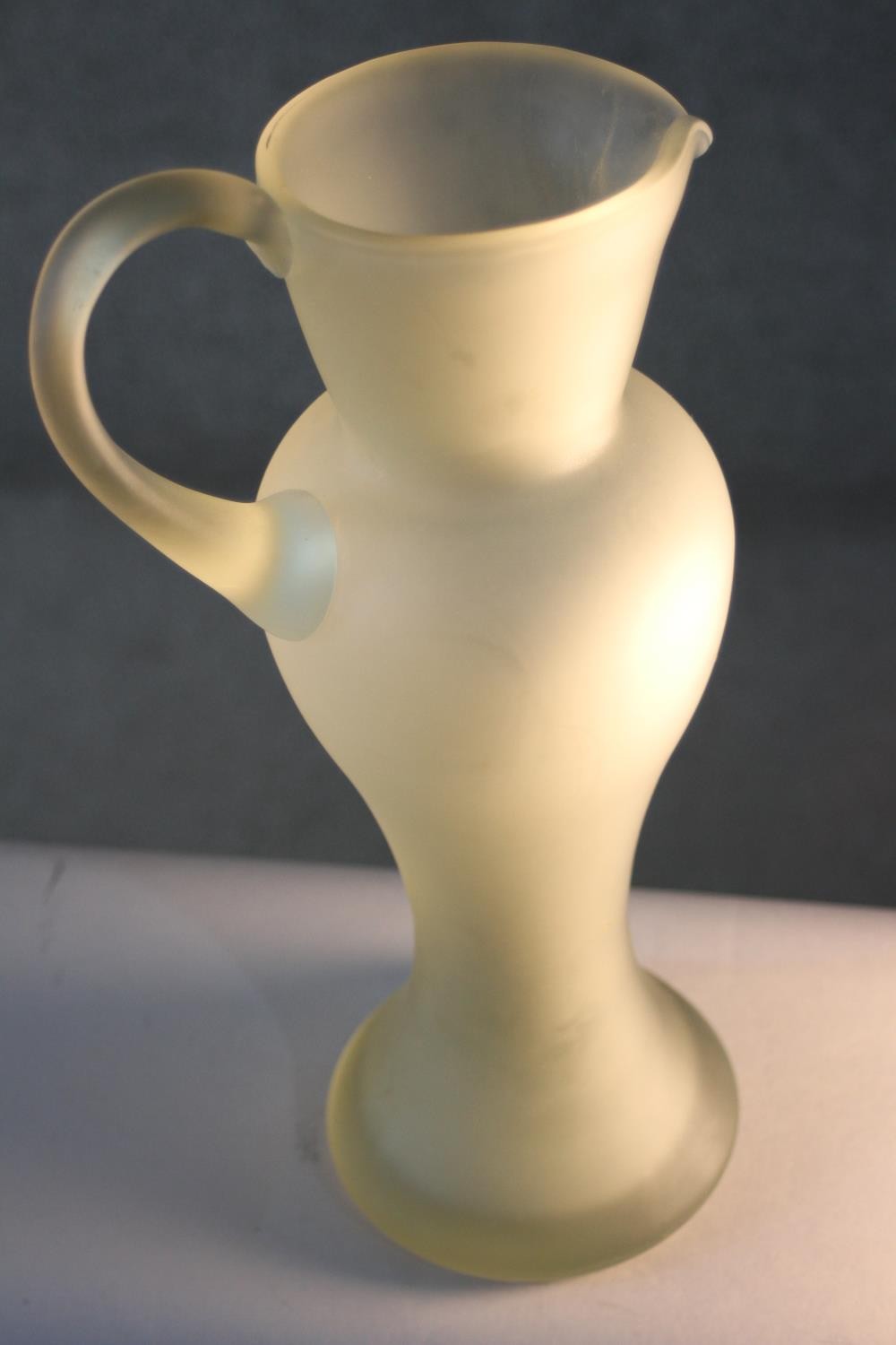 A vintage hand blown frosted clear art glass jug of elongated form. H.39 W.18 D.14cm. - Image 4 of 6