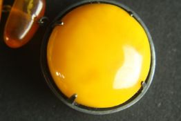 A early 20th century Russian silver and Baltic amber cloak brooch/pin. Comprising of a