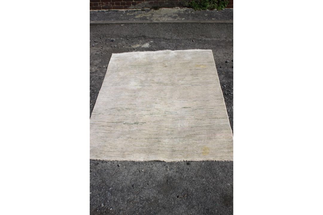 A sari silk carpet on a beige ground. H.240 W.170 cm - Image 1 of 4