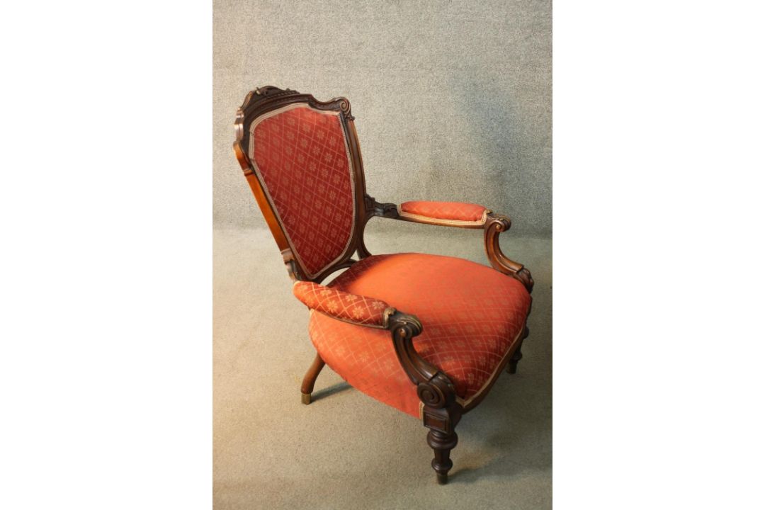 A late 19th century carved mahogany armchair in geometric floral upholstery on fluted tapering - Image 2 of 4