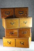 A collection of four vintage oak desk top filing drawers. H.20 W.50 D.40 cm.