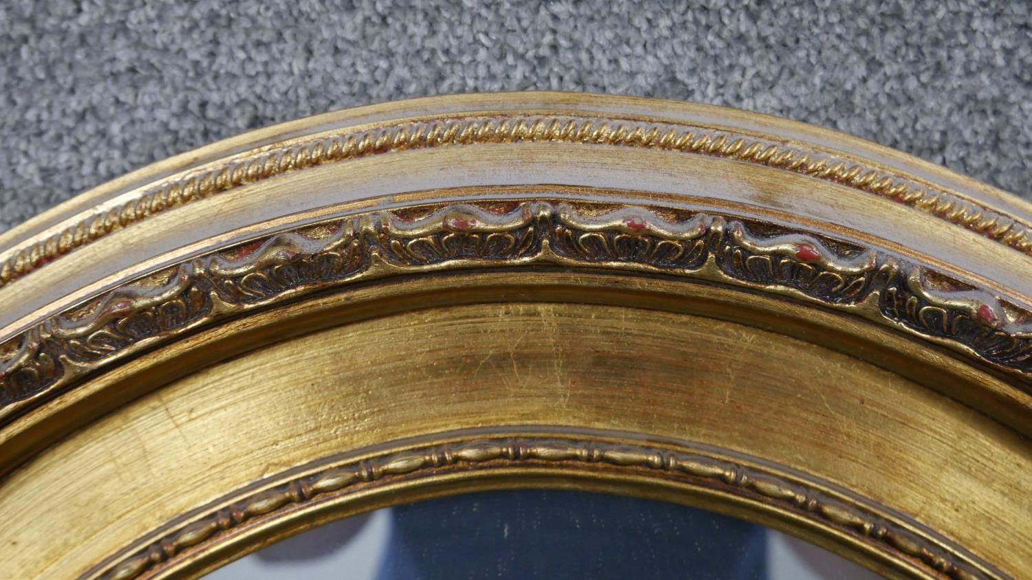 A large 20th century gilt framed wall mirror with beaded detailing. H.126 W.75cm - Image 2 of 4