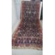 A large Kurdish runner with repeating motifs across the midnight ground within stylised multiple - Image 1 of 5