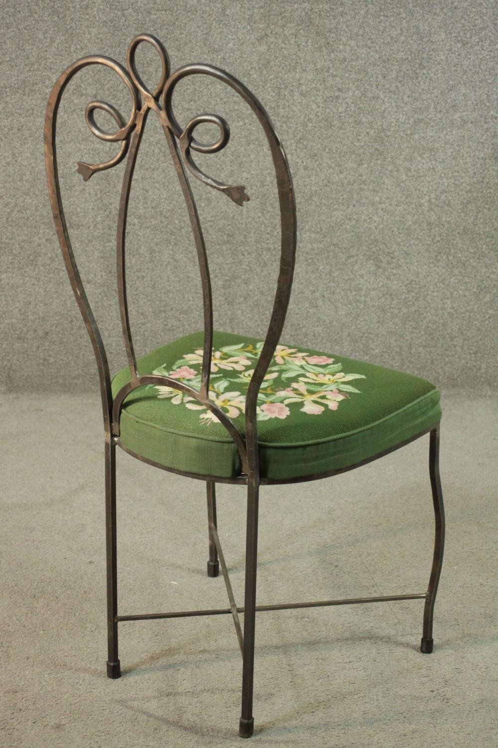 A set of six wrought iron dining chairs with green embroidered seats centred by a floral design. - Image 12 of 12