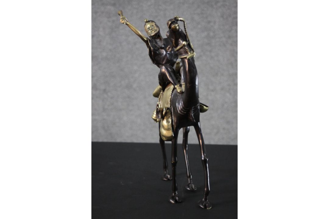 A West African hand made bronze sculpture from Burkina Faso of a camel and rider. Blackened to - Image 2 of 6