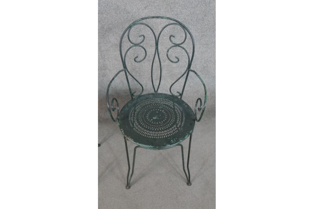 A set of three wrought iron garden chairs, with scrollwork to the back and arms, on a circular - Image 2 of 5
