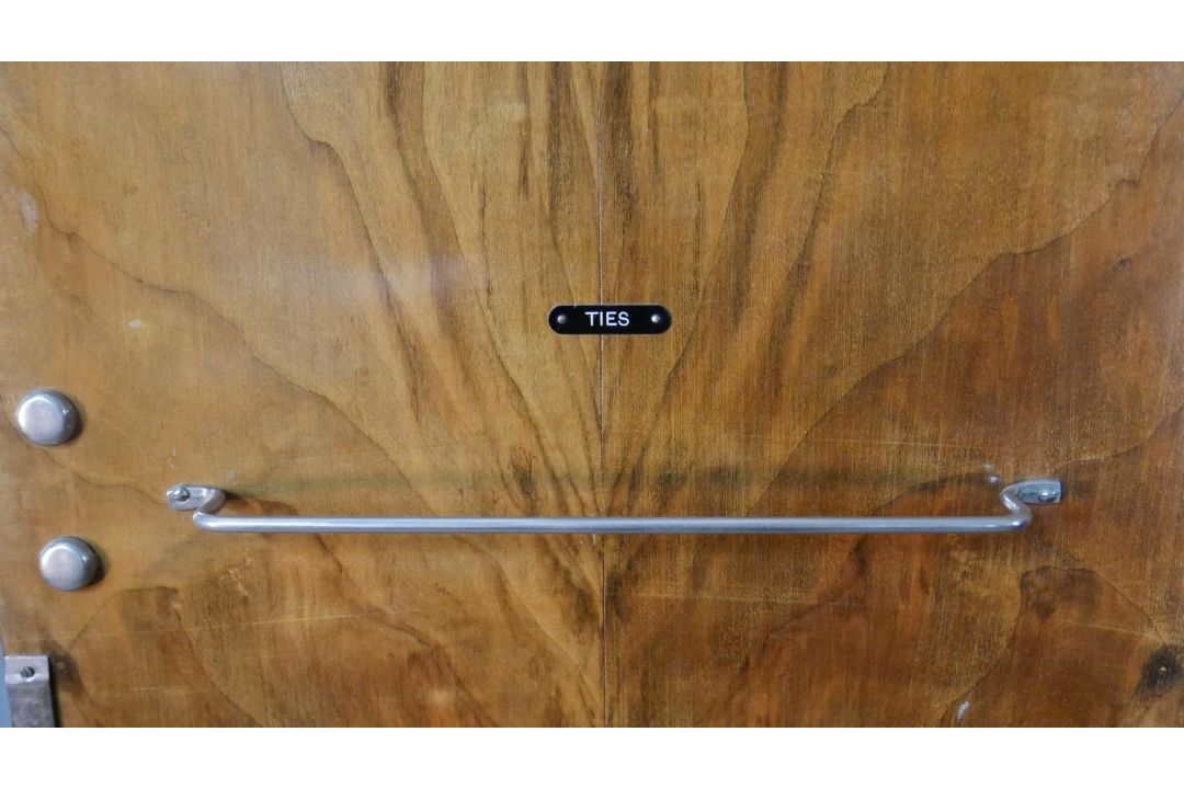An Art Deco figured walnut compactum wardrobe, with two quarter veneered doors, the fitted - Image 10 of 13