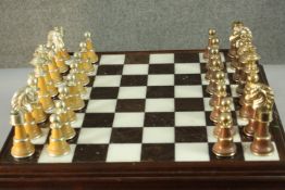 A large Italfama gold and silver plated chess set and black and white marble inlaid chess board with
