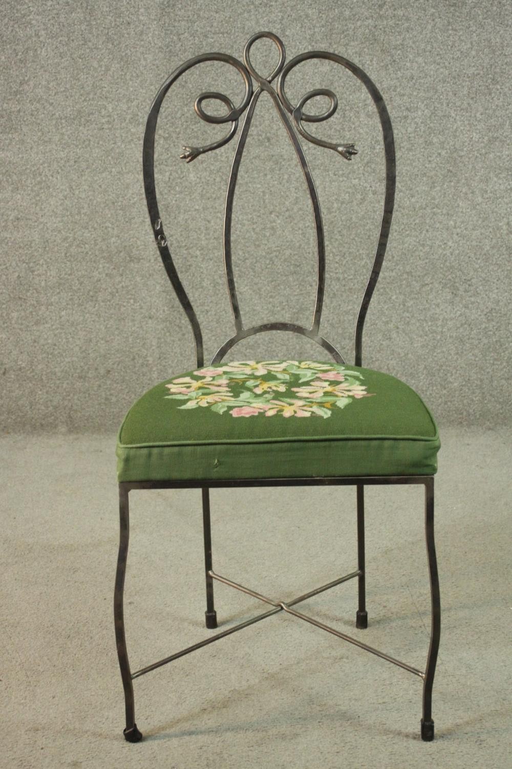 A set of six wrought iron dining chairs with green embroidered seats centred by a floral design. - Image 5 of 12