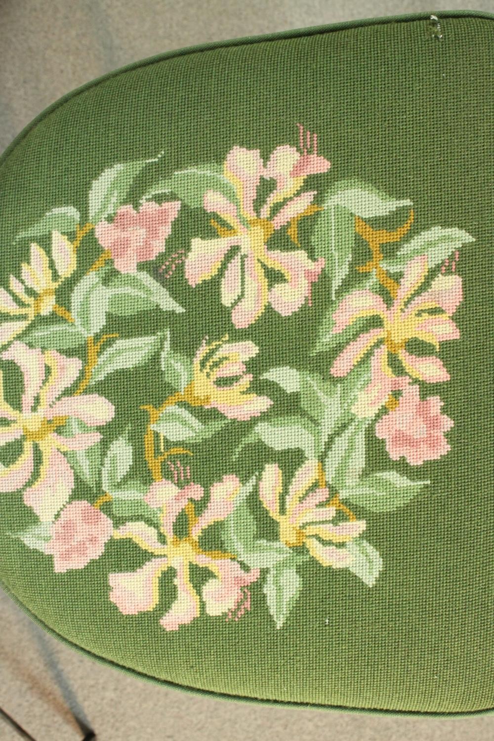 A set of six wrought iron dining chairs with green embroidered seats centred by a floral design. - Image 4 of 12
