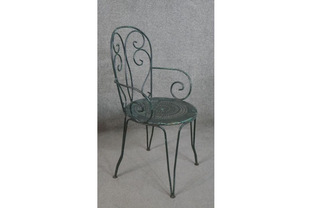 A set of three wrought iron garden chairs, with scrollwork to the back and arms, on a circular - Image 5 of 5