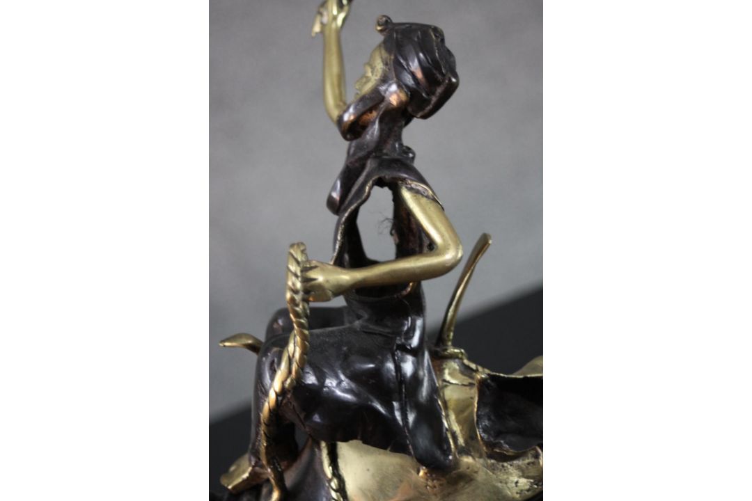 A West African hand made bronze sculpture from Burkina Faso of a camel and rider. Blackened to - Image 5 of 6