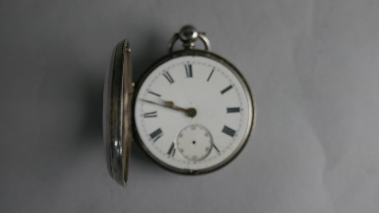 A Victorian silver gentleman's pocket watch with white enamel dial and black Roman numerals. ( - Image 3 of 5