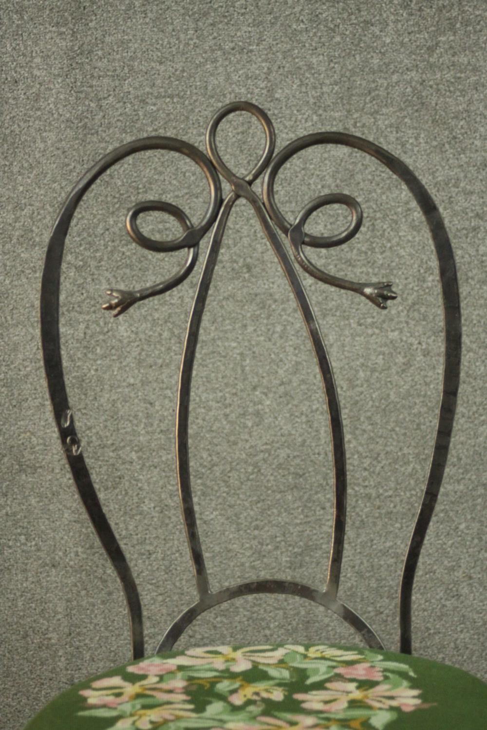 A set of six wrought iron dining chairs with green embroidered seats centred by a floral design. - Image 6 of 12