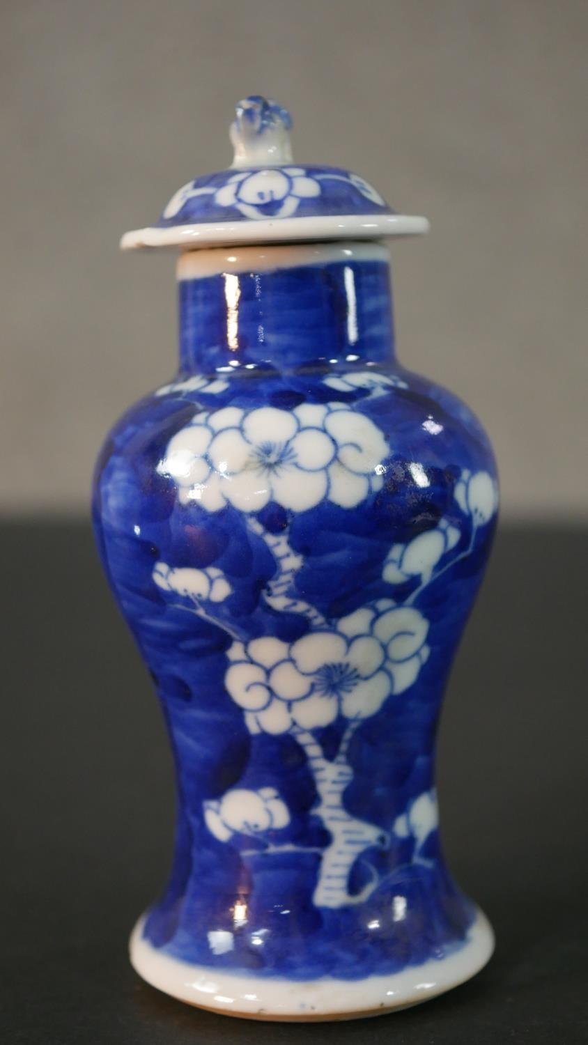An Chinese blue and white hand painted prunus blossom design ceramic lidded vase. H.13.5 Diam.6cm - Image 2 of 9