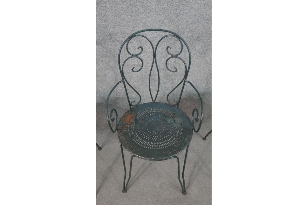 A set of three wrought iron garden chairs, with scrollwork to the back and arms, on a circular - Image 3 of 5