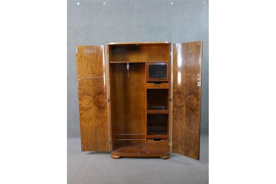 An Art Deco figured walnut compactum wardrobe, with two quarter veneered doors, the fitted - Image 3 of 13