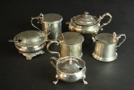 Six 19th and 20th century sterling silver hinged lid mustard pots, various designs, makers and assay