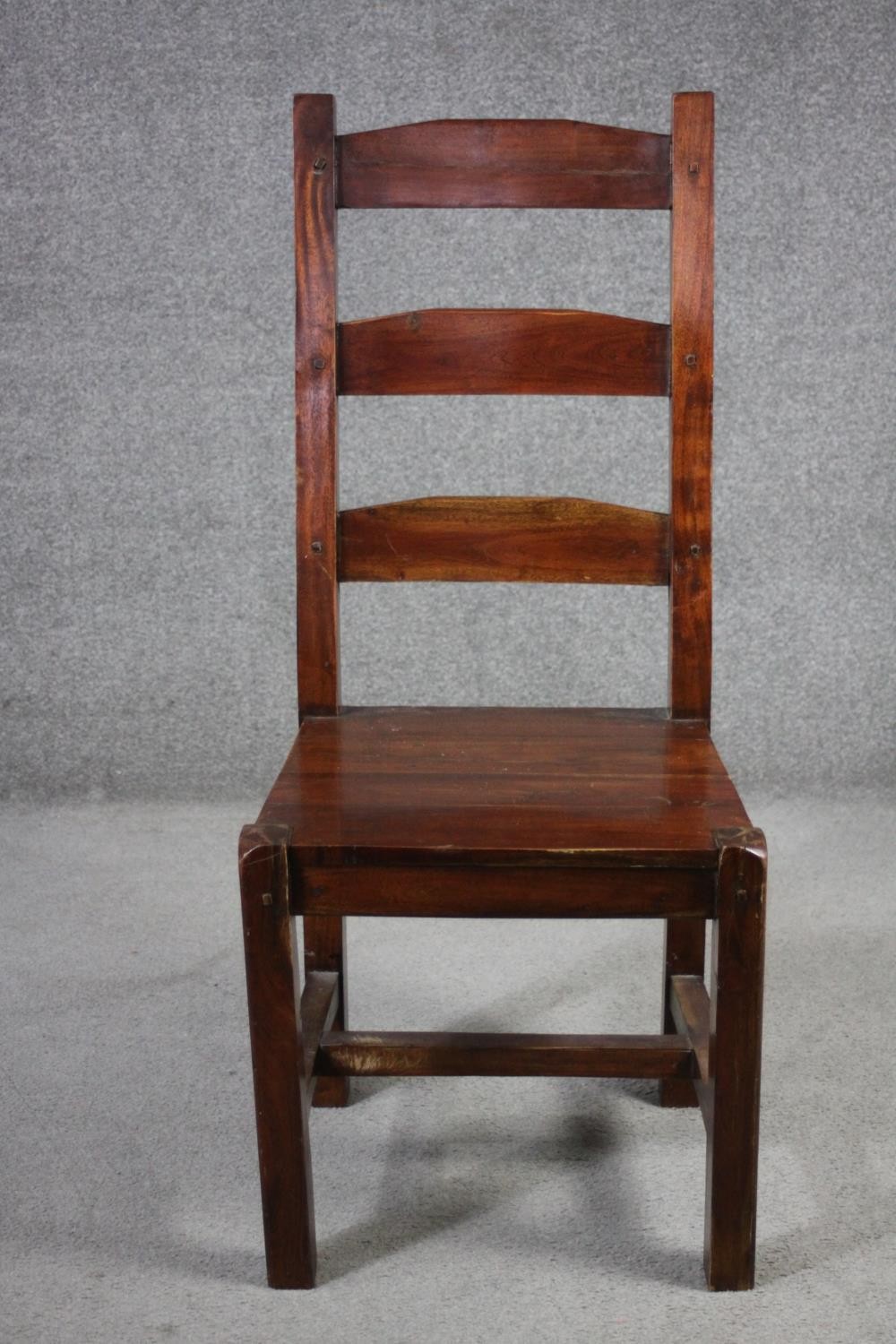 A set of eight mango wood ladder back dining chairs, the legs joined by H stretchers. - Image 4 of 11