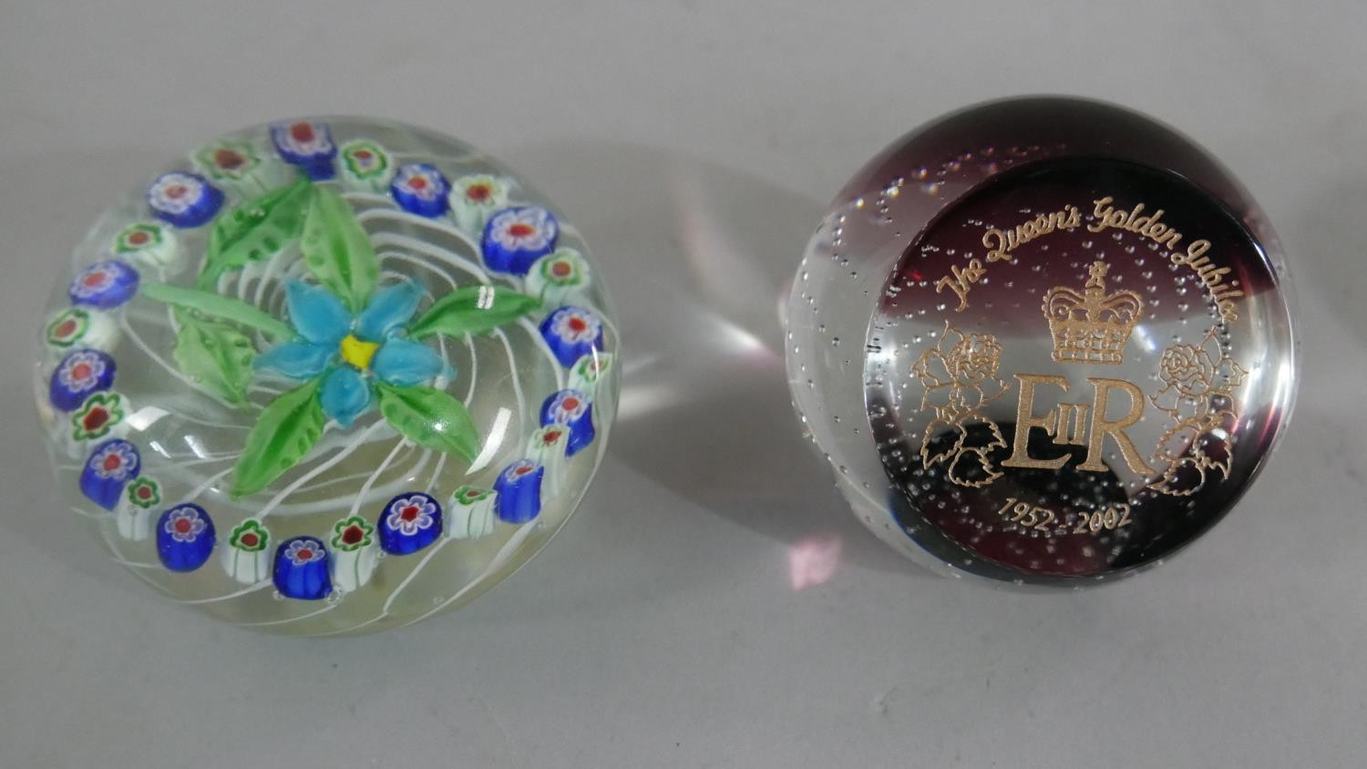 Four art glass lamp work paper weights with various designs. Makers marks to the base. - Image 2 of 3