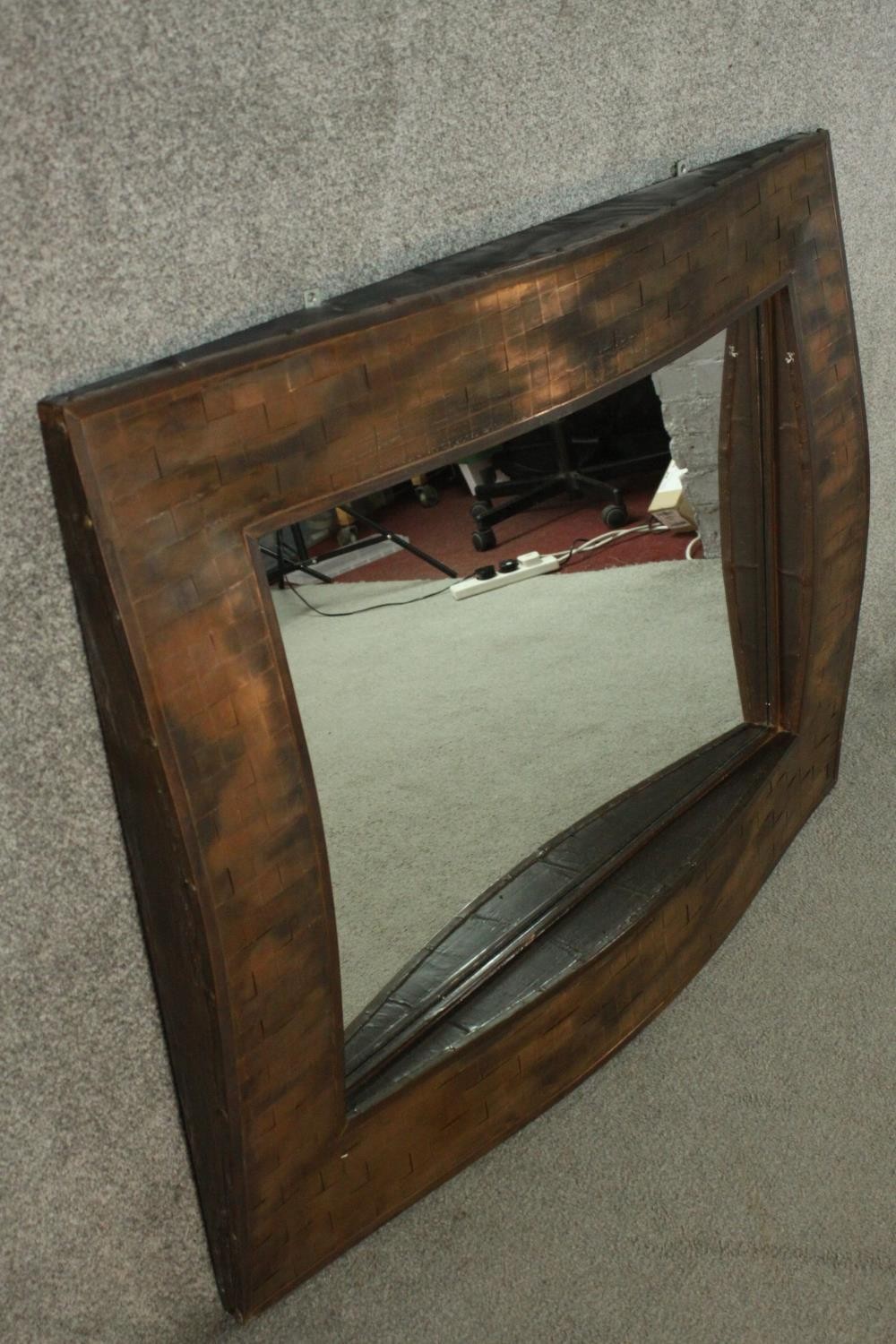 A contemporary copper framed mirror, of rectangular form, with a lattice design undulating frame. - Image 5 of 5
