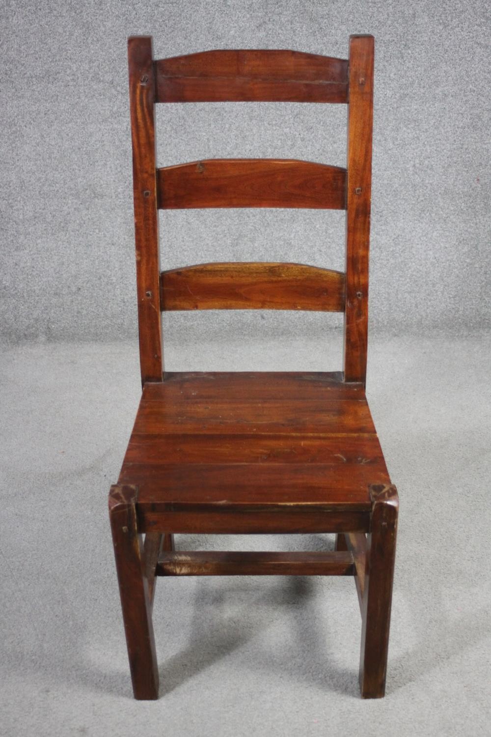 A set of eight mango wood ladder back dining chairs, the legs joined by H stretchers. - Image 5 of 11