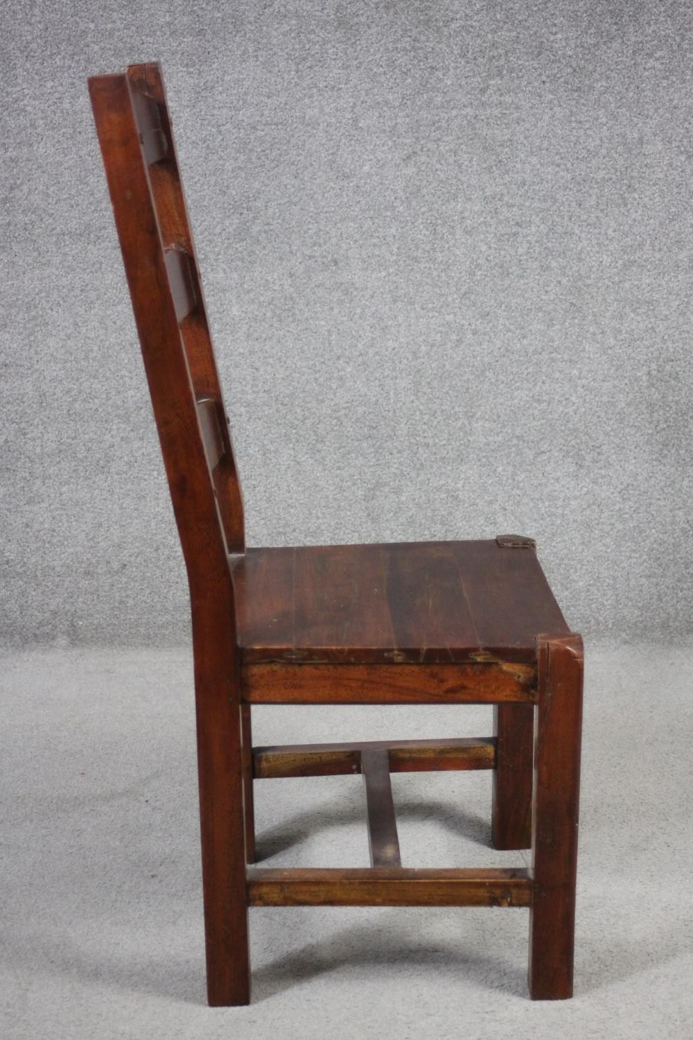 A set of eight mango wood ladder back dining chairs, the legs joined by H stretchers. - Image 7 of 11