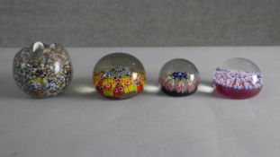 Three art glass lamp work paper weights and a pinched design Murano glass vase.