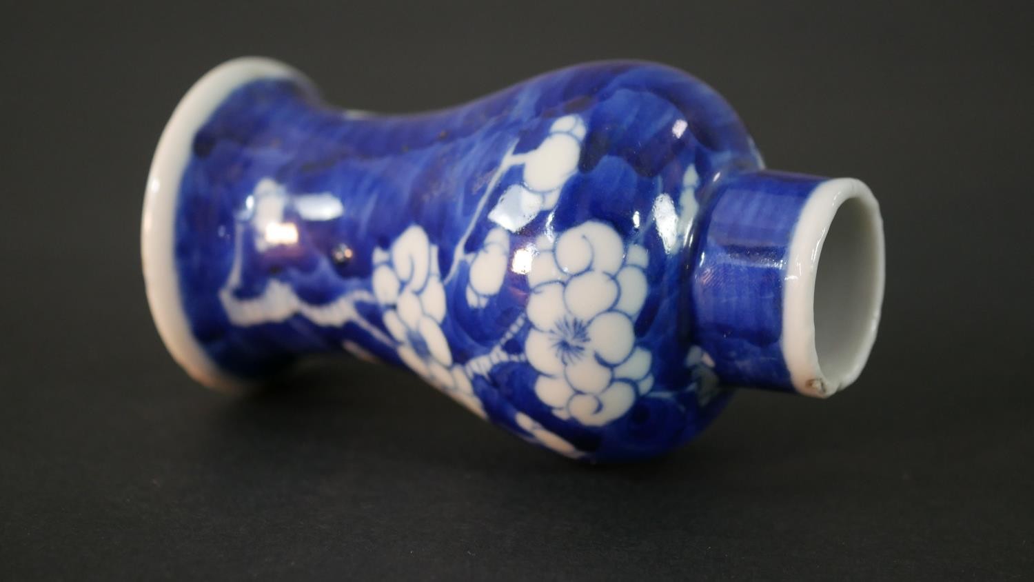 An Chinese blue and white hand painted prunus blossom design ceramic lidded vase. H.13.5 Diam.6cm - Image 3 of 9