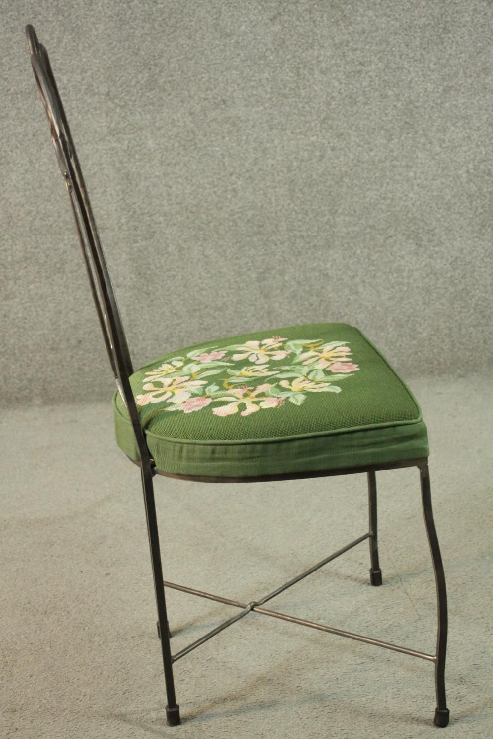 A set of six wrought iron dining chairs with green embroidered seats centred by a floral design. - Image 11 of 12