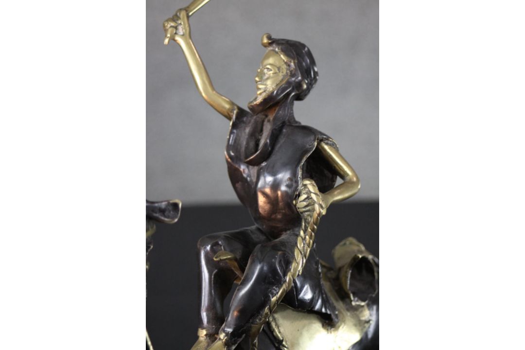 A West African hand made bronze sculpture from Burkina Faso of a camel and rider. Blackened to - Image 4 of 6