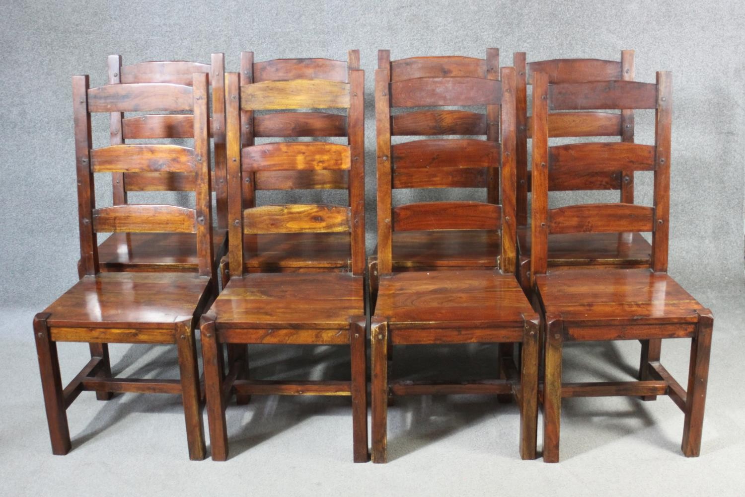 A set of eight mango wood ladder back dining chairs, the legs joined by H stretchers. - Image 2 of 11