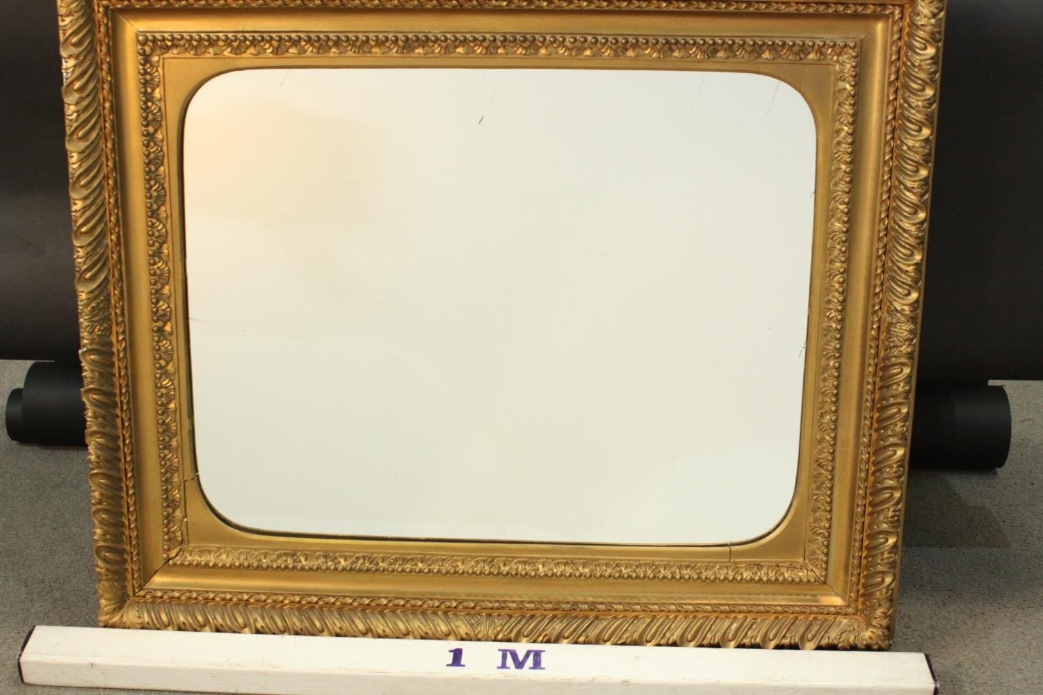 An early 20th century carved giltwood and gesso framed wall mirror. The frame decorated with - Image 3 of 4