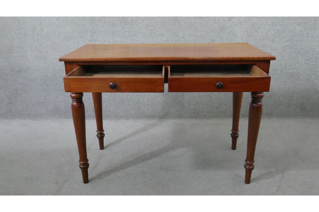 A Victorian mahogany two drawer side table, of rectangular form, on turned legs. H.75 W.107 D.53cm - Image 4 of 6
